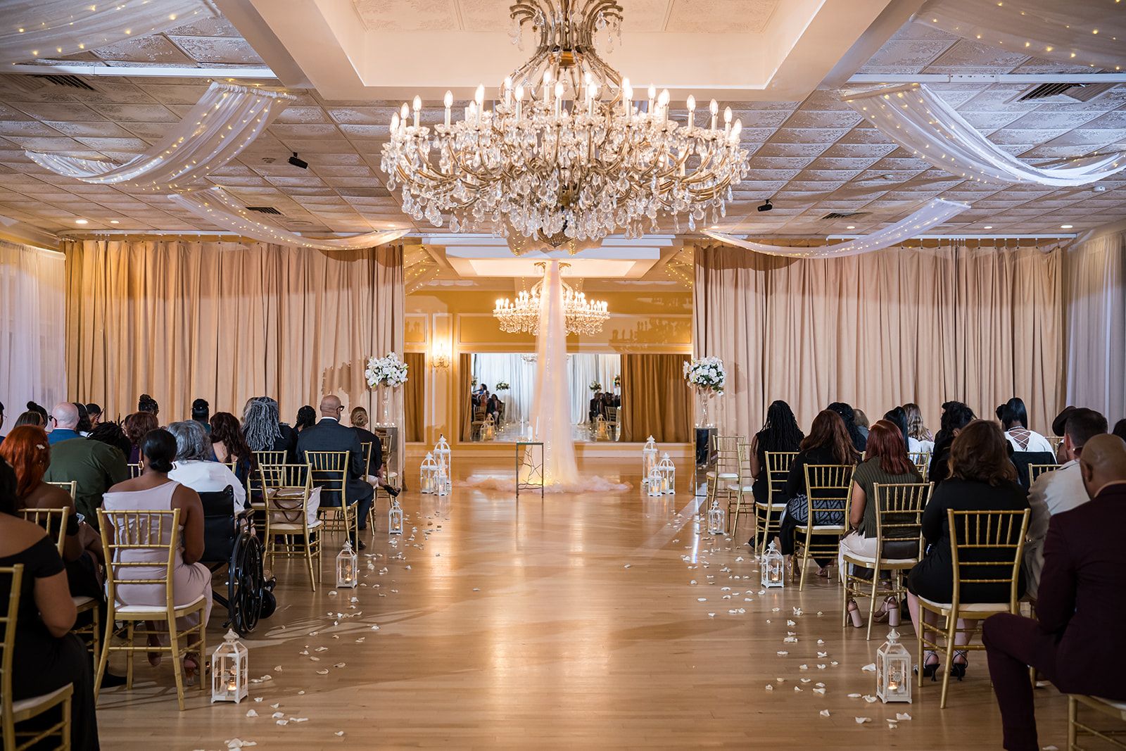 Luxury wedding ballroom featuring elegant ceremony set up and Philadelphia wedding guests 